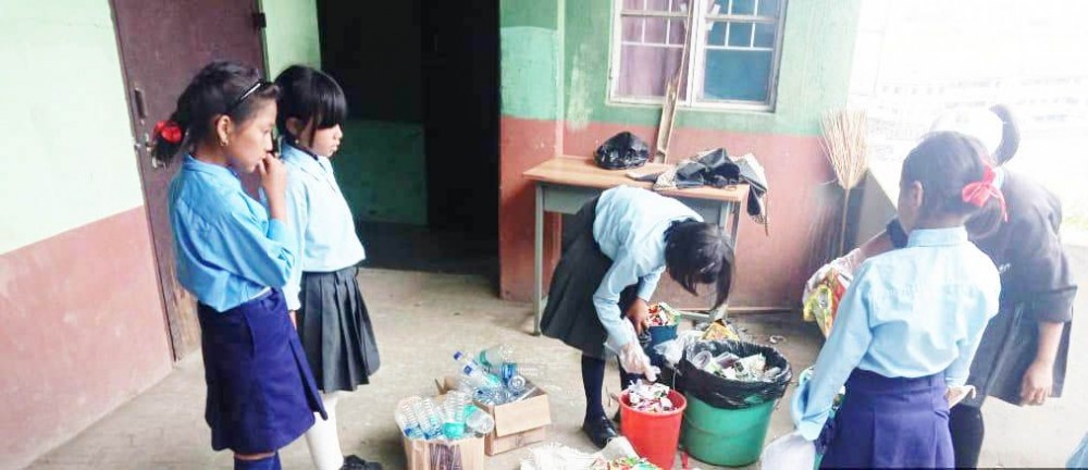 Students of Government Primary School for CWSN, Lerie re-cycling plastics on June 5.